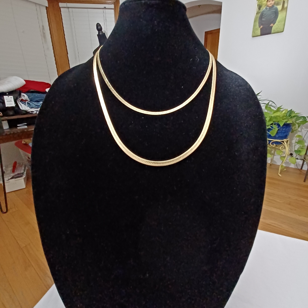 TWO GOLD TONE HERRINGBONE CHAINS